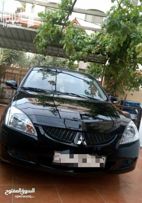 ميتسوبيشي لانسر 2006 1600 توب ترونيك  4جيد  ترخيص سنه كامله  لون اسود