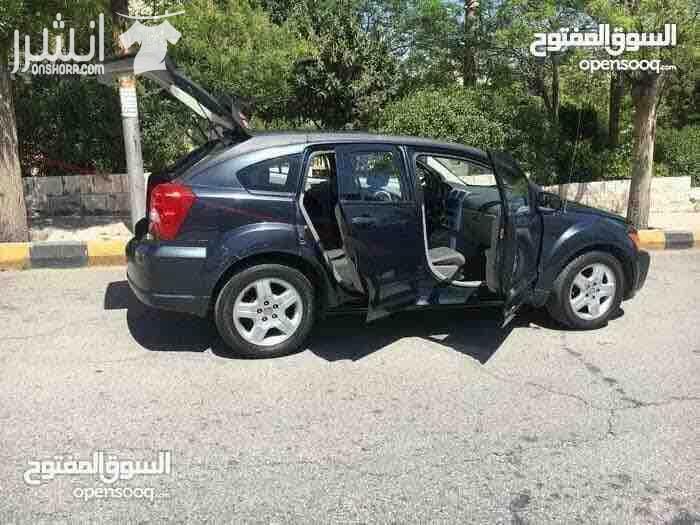 دودج كالبر الفحص 4 جيد ماتور 2000 سي سي جير اوتوماتيك لون فيراني مميز وضع السيارة توب نظافة صيانة كاملة من زيوت  فلاتر   بركات   بواجي   هيئة امامية   خلفيو من صنوبرصات و كفات و عمدان توازن و جلود (لا...
