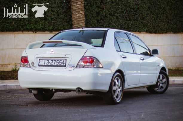 ميتسوبيشي لانسر موديل 2007 لون ابيض ماتور 1600الاصلي وارد الكويت جير اتوماتيك سعرالبيع 8300 كاااش 0797077794 جنطات اللانسر الأصلية كوندشن حامي بارد غاز جديد فحص امامي جيدات خلفي ضربه على الرأس ترخ...