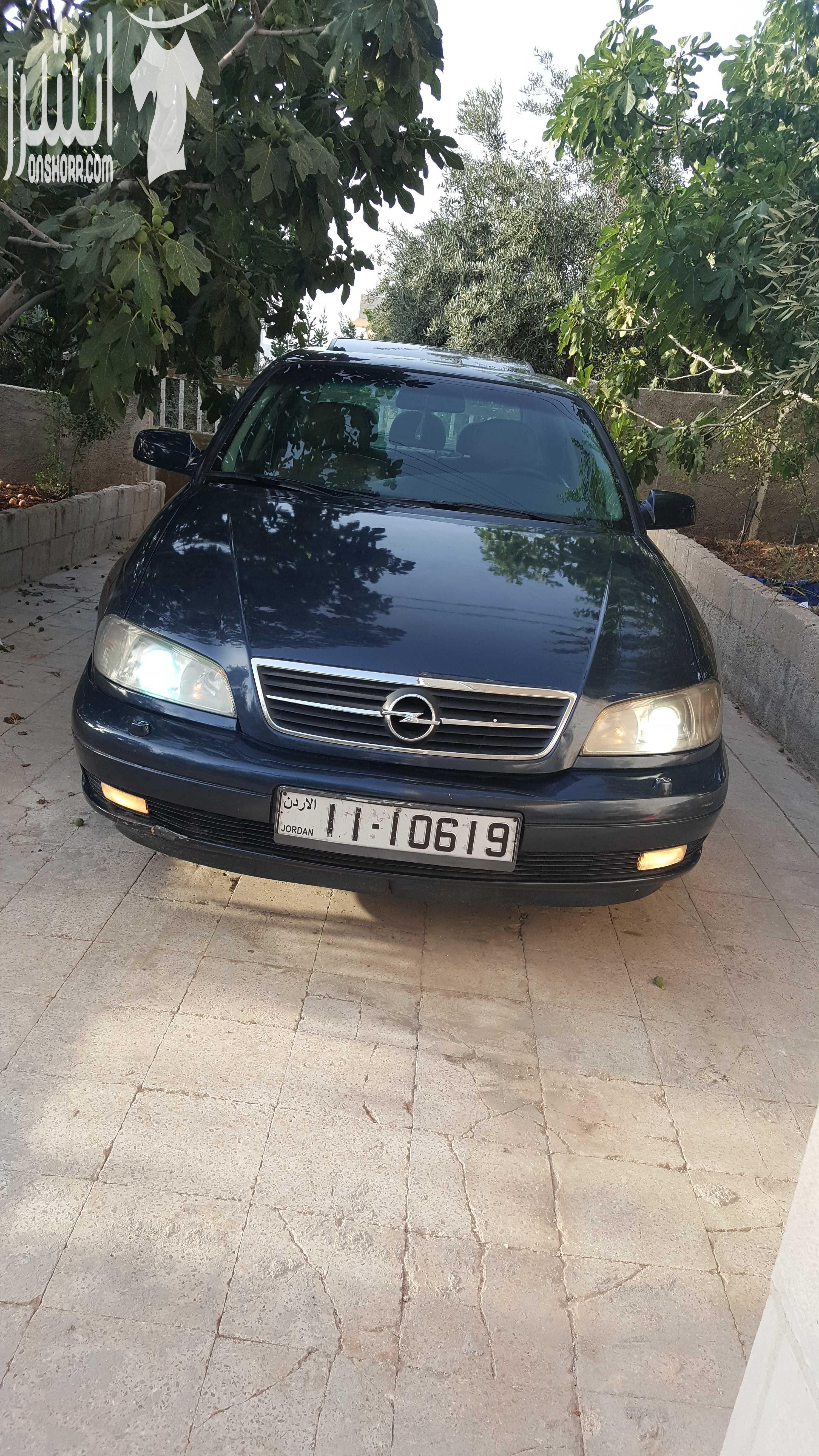 اوبل اوميغا موديل 2003 لون كحلي 2200سي سي ،جنط 17 اصلي، فتحة، حساسات خلفية اصلية، مثبت سرعة، مسجل philips مع سي دي تشينحر اصلي، تحكم طارة،  اضوية زنون، نظام امان للاطفال  و السرقة، فرش جلد، كراسي كهرب...