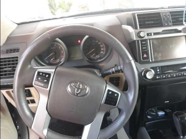 تويوتا برادو 2015 وارد الشركه قاطعه مسافة 30,000 كيلو مواصفات خليجيه  فل كامل ما عدا الفرش والفتحه  ماتور V4 بسعة 2700cc شاشه  بلوتوث موري كهرباء فور ويل درايف 7 ركاب  ثلاجه  مراية سقف بانوراما حساسات...