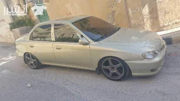 كيا سيفيا (2 ) فحص كامل لون شمباني بتعطي قصعات اثر فتحة جاهزة وفايعة ومشغولة صح والاضافات والمزايا كالاتي: 1-دهان جديد 2-ترخيص سنة كاملة 3-جنط 17 ماركة dapper مع كوشوك جديد 4-فتحة كرستال بالسقف 3 حرك...