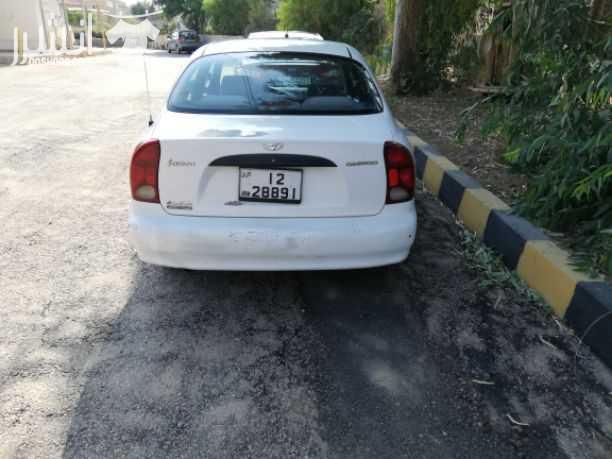 دايو لانوس 2001 فحص كامل ماتور 1600 السياره بحاجه للدهان فقط مالك واحد من الحره وضع بلادها