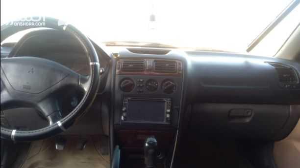 ميتسوبيش جالنت 2004  جير عادي  محرك 2000cc قوي واقتصادي  فحص 4 جيد مرفق بالصور  بيع او بدل