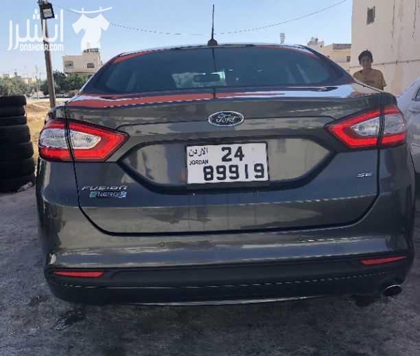 سياره للبيع فورد فيوجن موديل ٢٠١٦ انيرجي هايبرد بحاله الوكاله المسافه المقطوعه ٢٠ الف ميل الاضافات فل ناقص فتحه السقف فحص ٤ جيد لون السياره فيراني داخل جلد اسود المراجعه الاتصال على الرقم 0785014455