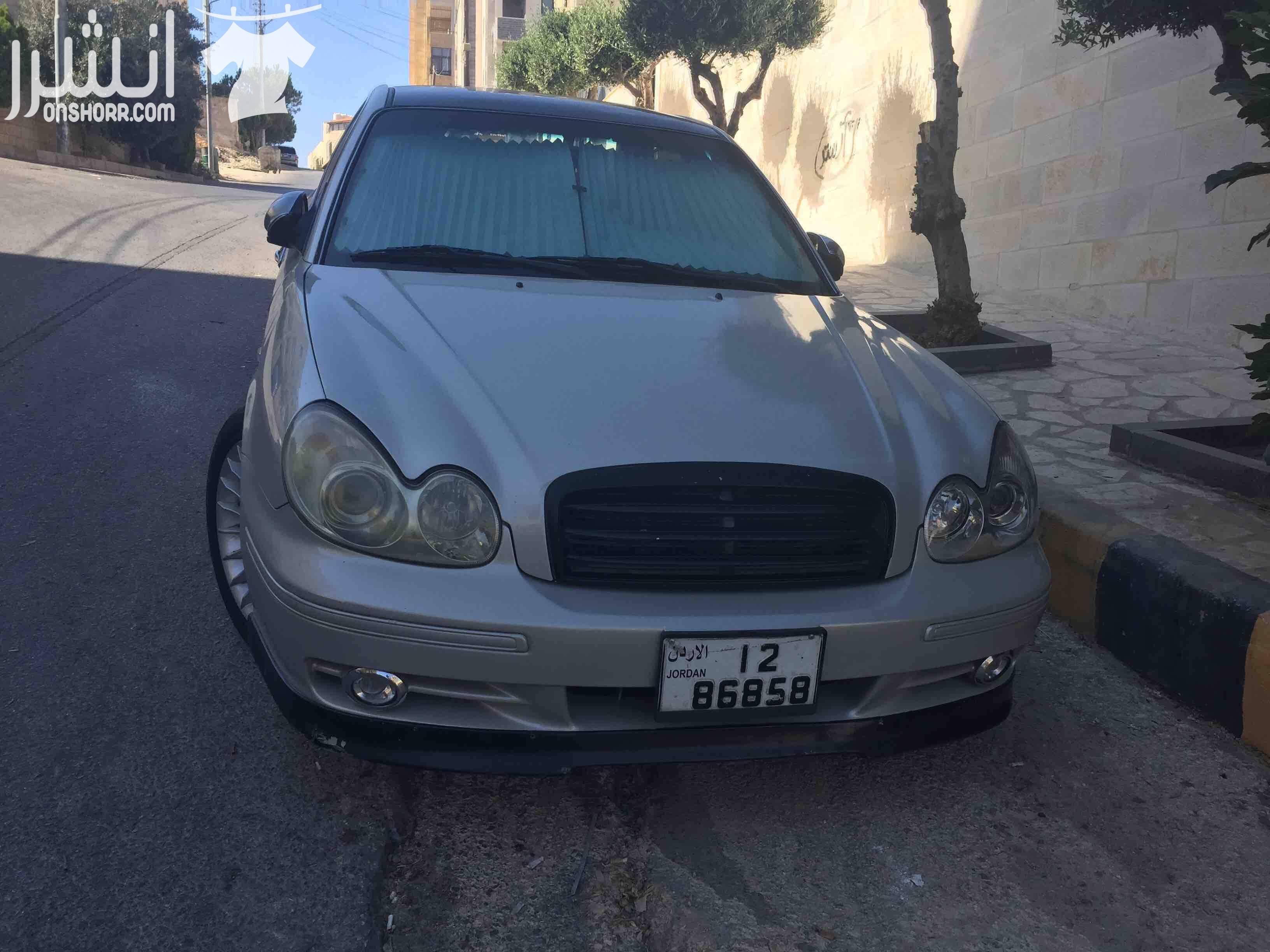 هونداي سوناتا 2002 محرك 2000 cc سلفر مميز تنده سوداء نازله على الرخصه جير تب ترونك جلد بالكامل مكيف حامي بارد شغال 100% مسجل كينود شاشه تتش الأصلي سماعات بيونير الأصلي جنط 17 البينا الله يبارك لصاحب ا...