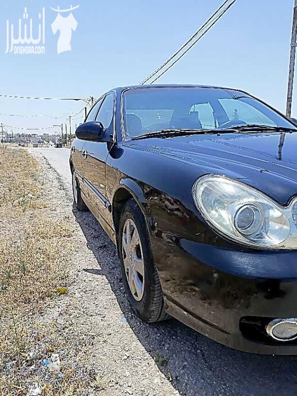 سوناتا 2003  وارد خليج بنزين اصلي  فل ماعد الفتحه  محرك 2000 cc جير توب ترونك اتوماتيك اللون اسود ملوكي دهان انجليزي  من 3شهور  فحص السيارة  مرفق بالصور جيد جيد جيد وقصعات  جيد هريان خفيف  سوناتا 2003...