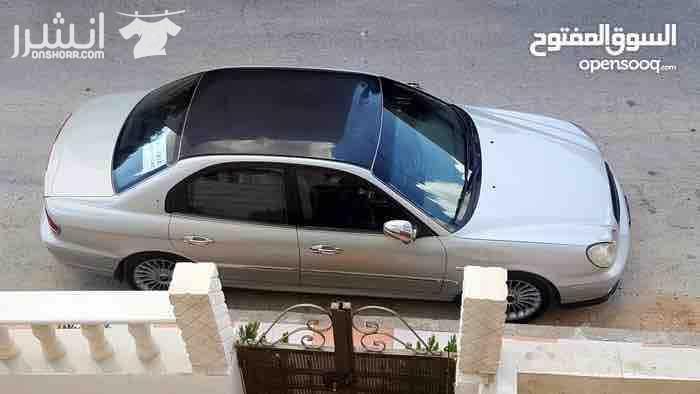 هونداي سوناتا 2002 محوله من غاز الى بنزين محرك 2000 cc سلفر مميز تنده سوداء نازله على الرخصه جير تب ترونك جلد بالكامل مكيف حامي بارد شغال 100% مسجل كينود شاشه تتش الأصلي سماعات بيونير الأصلي جنط 17 ال...
