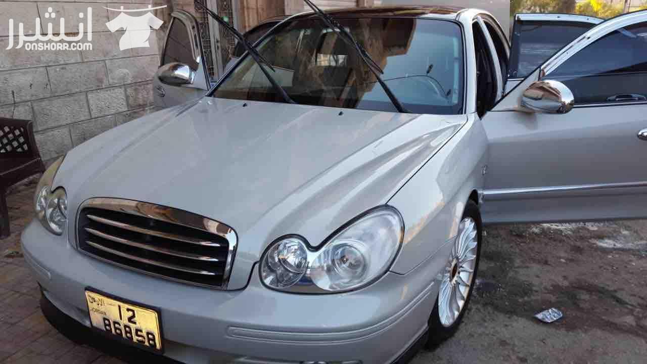 هونداي سوناتا 2002 محوله من غاز الى بنزين محرك 2000 cc سلفر مميز تنده سوداء نازله على الرخصه جير تب ترونك جلد بالكامل مكيف حامي بارد شغال 100% مسجل كينود شاشه تتش الأصلي سماعات بيونير الأصلي جنط 17 ال...