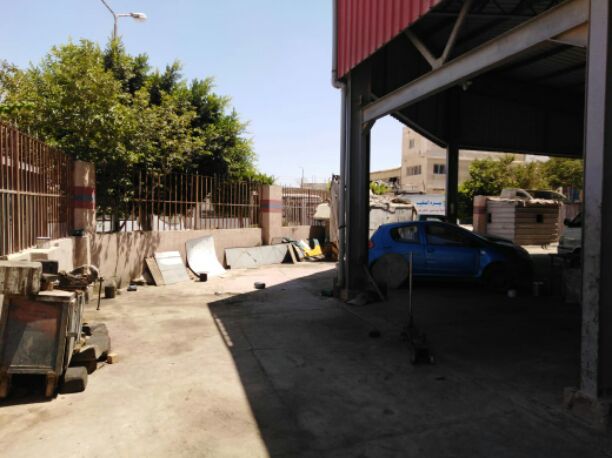 مركز خدمة سيارات بترخيص التشغيل والسجل بالمنطقة الصناعية ببرج العرب كامل المرافق والانشاءات