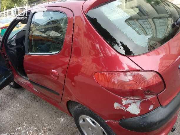 سيارة بيجو لون خمري بحالة جيدة جدا موديل ٢٠٠٣/٢٠٦ جير عادي للبيع