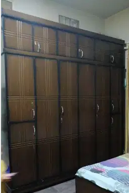 Bed and cupboard