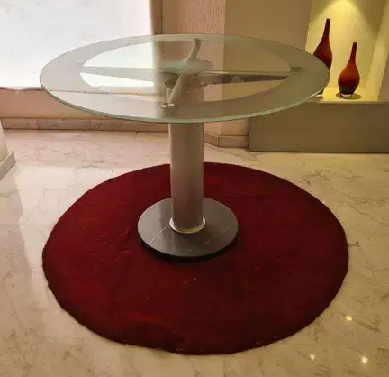 Round Glass top dining table for 4

Round glass table good for home or offices. As dining or meeting table. Thick tempered glass with marble base carries its rich look.